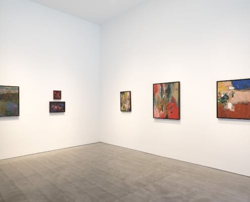 Installation View © Roz Akin, Courtesy Berry Campbell, New York A view of a gallery showing two white walls perpendicular to one another with five paintings, and a hardwood floor.